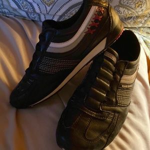 Diesel, size 7.5, slip on black tennis shoe.